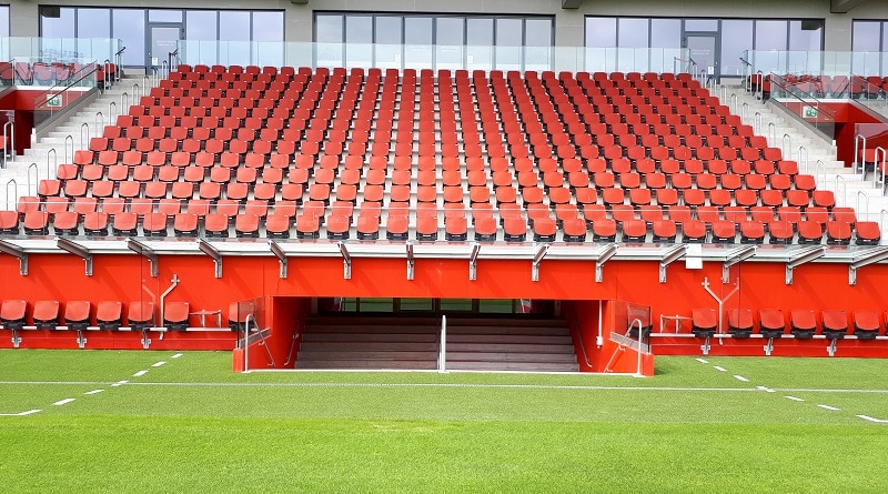 The benches and player entrance to the pitch